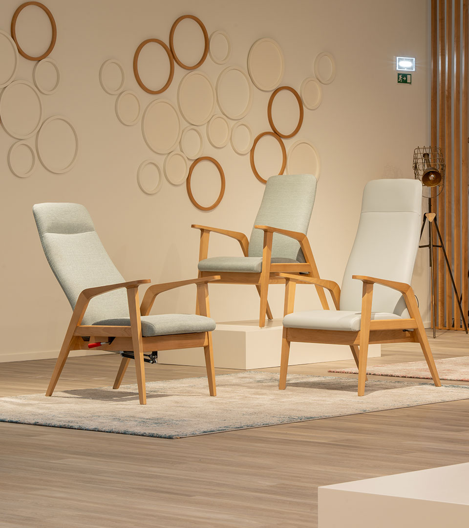 Medical table with wooden stepping stool in front